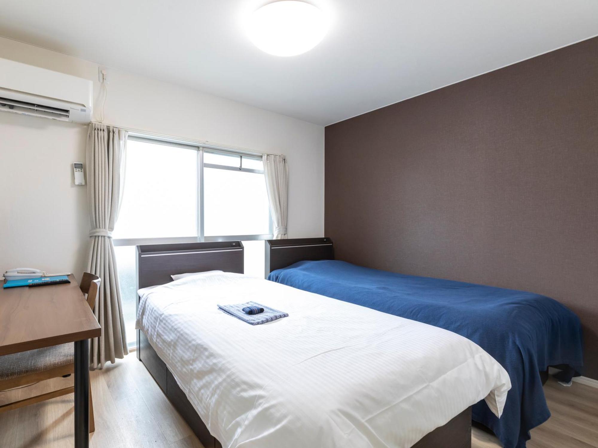 Tabist Motodai Business Hotel Kanonji Quarto foto